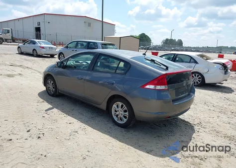 2011 Honda Insight Ex from USA, damaged, VIN JHMZE2H70BS008854